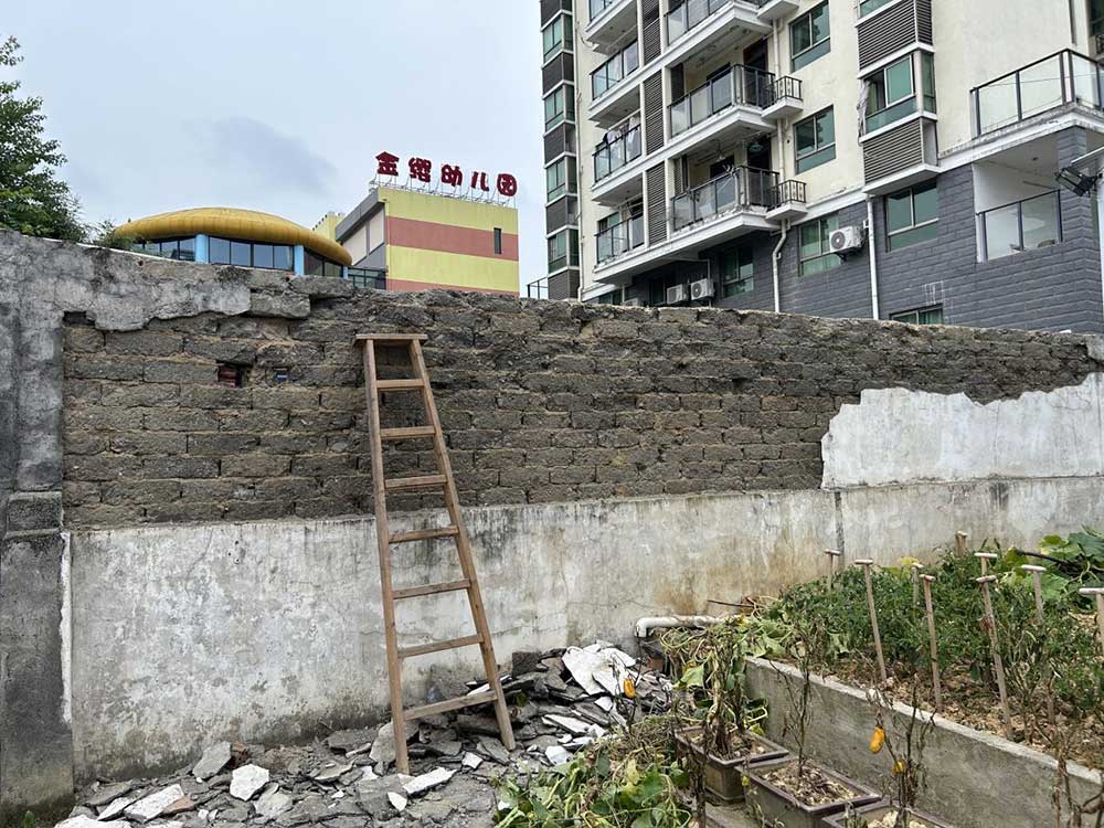 修缮危墙除隐患 齐力共筑“连心墙”